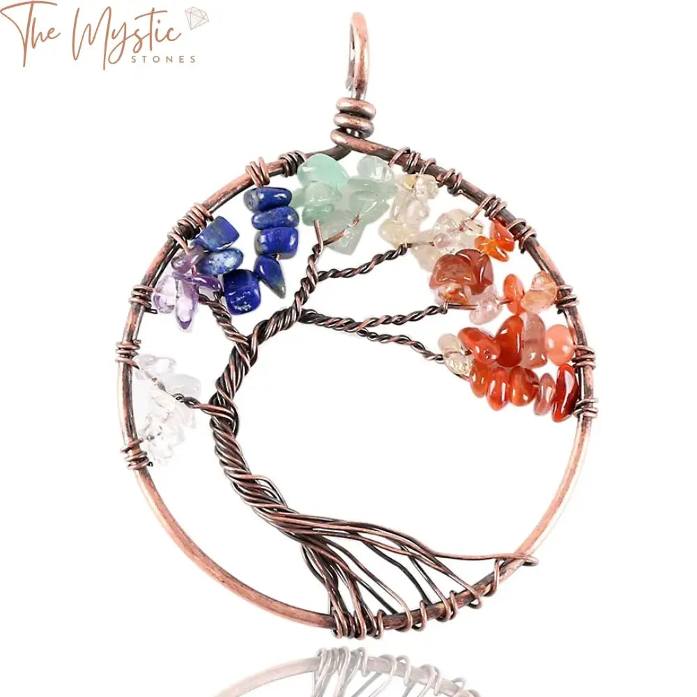 A heart-shaped pendant featuring a mesmerizing Tree of Life design crafted from antique copper plating.