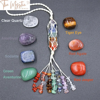 A set of 7 polished natural stones, each representing one of the chakras, arranged in a row.