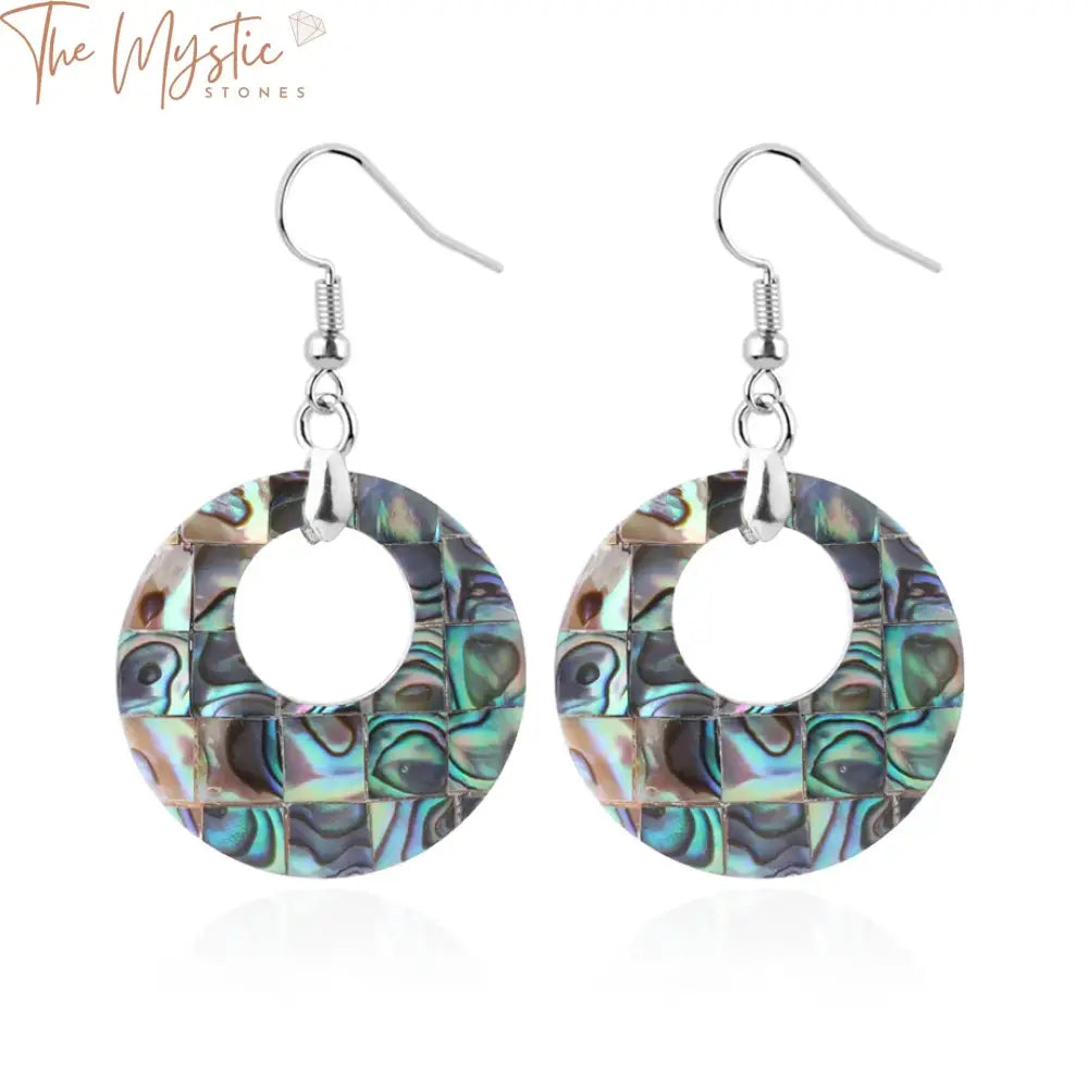 Pair of retro donut earrings featuring natural abalone seashells in a pink, white, and colorful pattern.