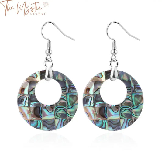 Pair of retro donut earrings featuring natural abalone seashells in a pink, white, and colorful pattern.