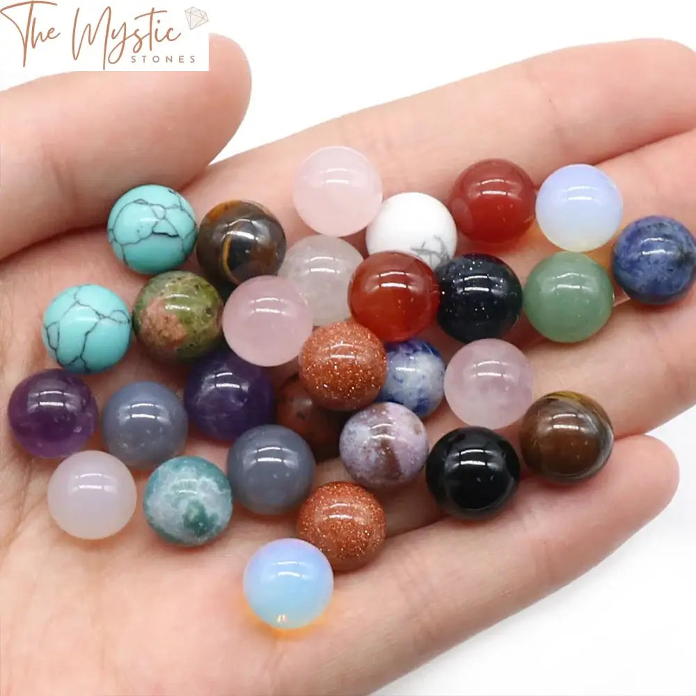 A set of 10 round, polished agate crystal beads, each approximately 10mm in diameter, displayed on a neutral background.