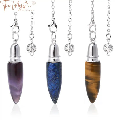 A collection of five polished crystal pendulum pendants displayed vertically.