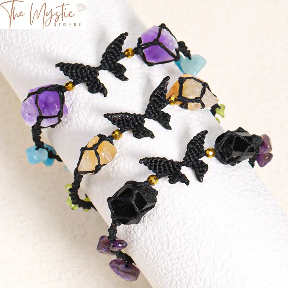 A handmade bracelet featuring a rope-braided design with a butterfly accent.