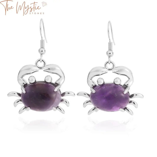 A pair of stylish drop earrings featuring animal crab pendants crafted from amethyst crystal.