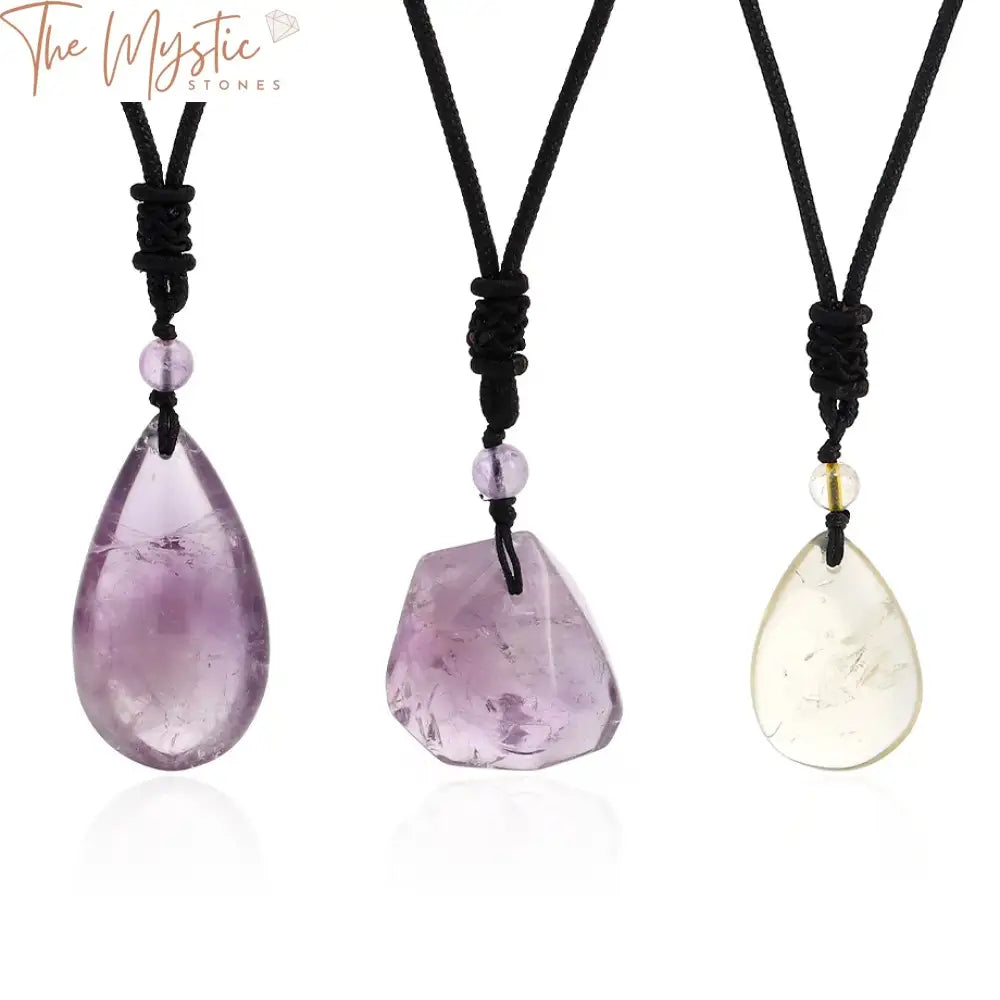 A rugged and eye-catching necklace showcasing irregularly shaped natural stones in deep purple and translucent clear hues.