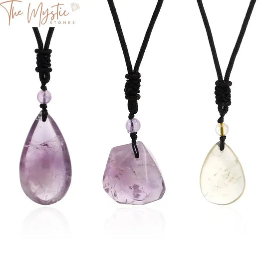 A rugged and eye-catching necklace showcasing irregularly shaped natural stones in deep purple and translucent clear hues.