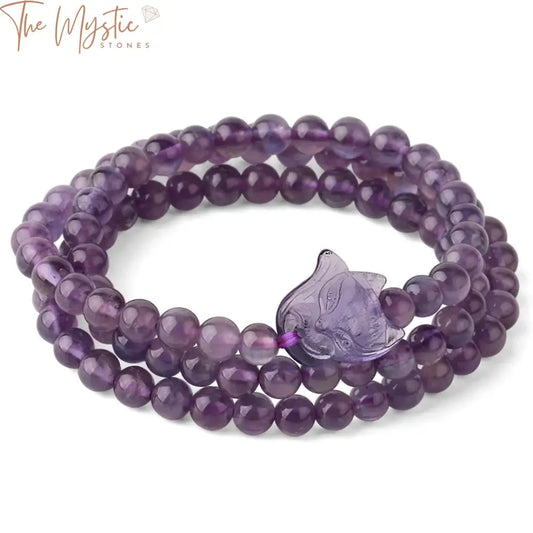 A bracelet made of 6mm natural stone purple crystals, specifically amethysts, intricately wrapped into multiple strands.