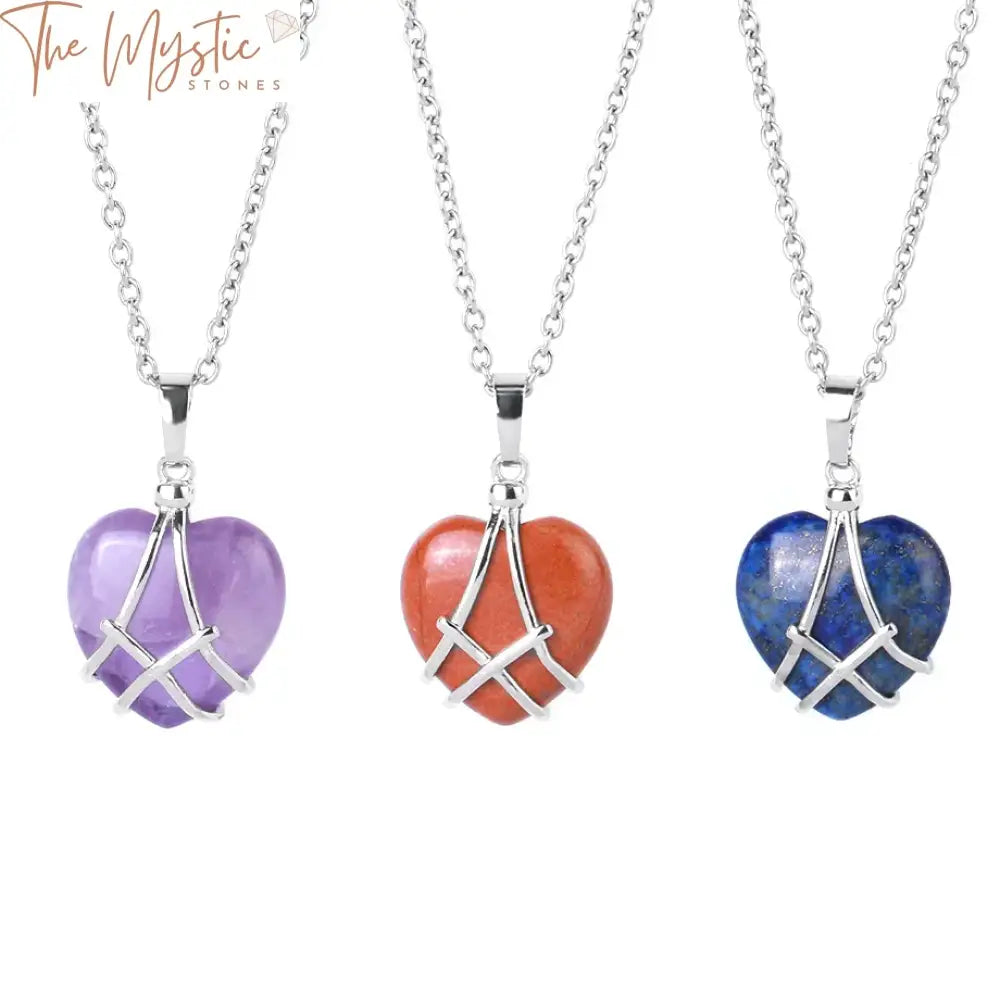 A heart-shaped crystal pendant necklace featuring a wire-wrapped design.