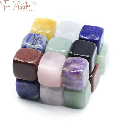 A collection of natural stone square blocks featuring amethyst and rose quartz gemstones.