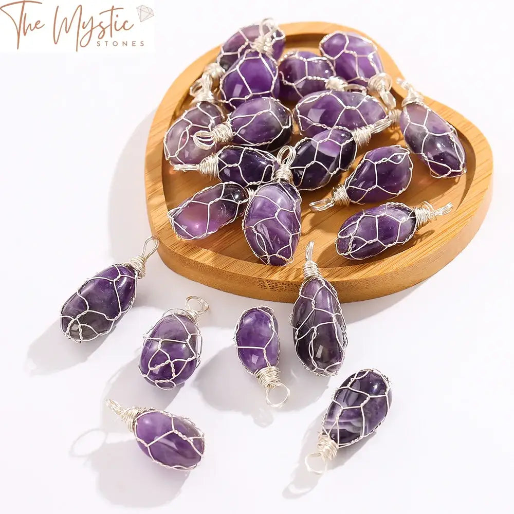 A single natural amethyst stone, wrapped in silver-colored wire forming a pendant.