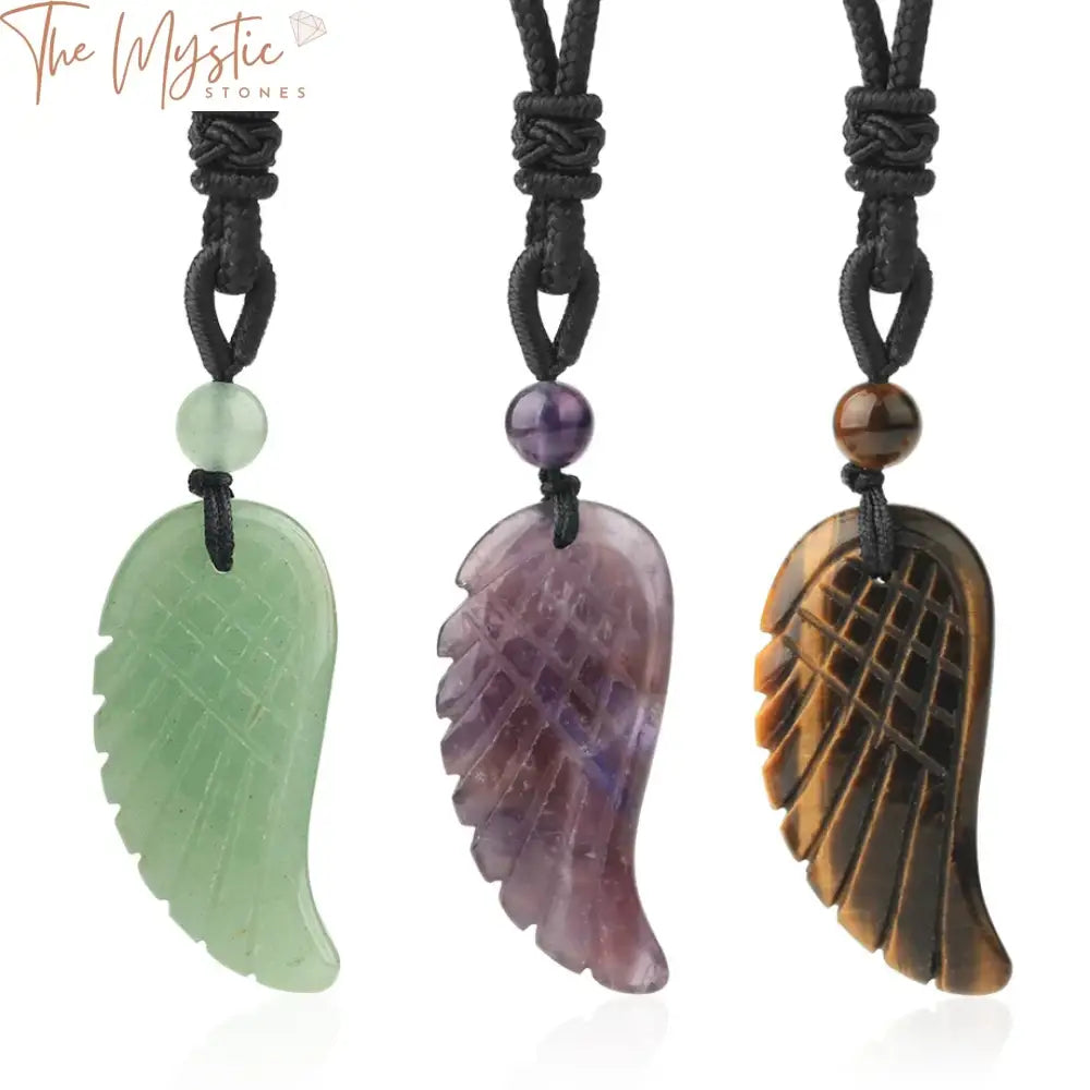 A collection of elegant necklaces featuring pendants, each shaped like angel wings.