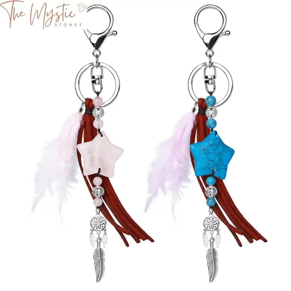 A collection of keychains featuring dream catchers with blue feathers and tassels.