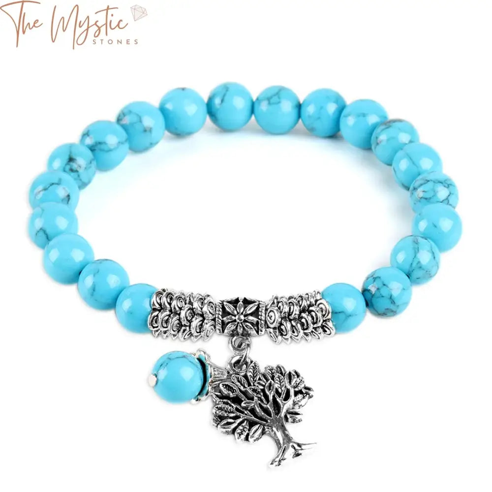 A collection of 8mm blue howlite bead bracelets, each featuring a vintage silver-toned tree of life pendant.