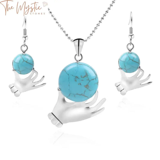 A jewelry set featuring a necklace and dangle earrings made of round flat blue Howlite stones.