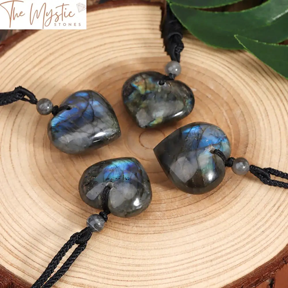 A heart-shaped blue labradorite crystal pendant with rainbow sheen, expertly crafted into a necklace for men.