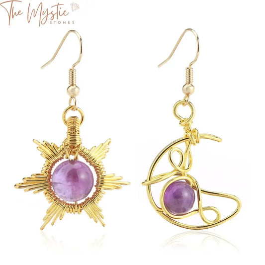 A pair of elegant earrings featuring a sun and moon design with bohemian flair.