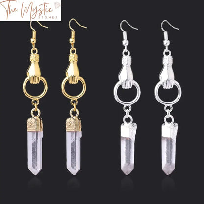 A pair of long drop earrings featuring natural white crystal quartz stones in an irregular shape.