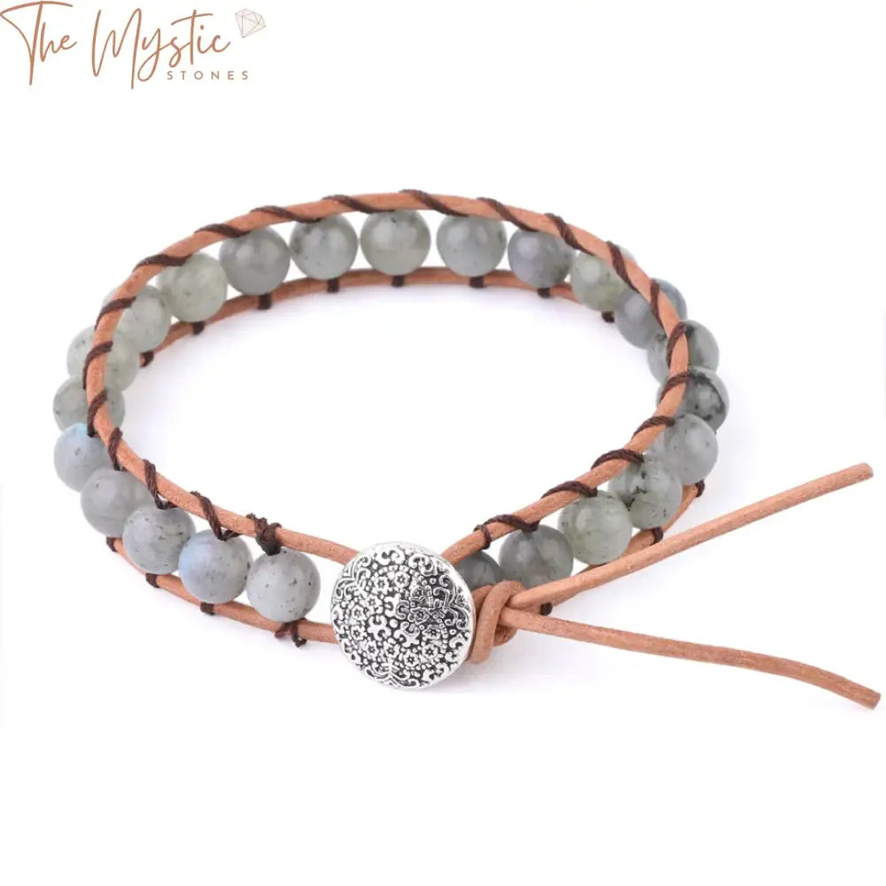 A bohemian-style handmade bracelet featuring natural stone spectrolite and gray labradorite beads.