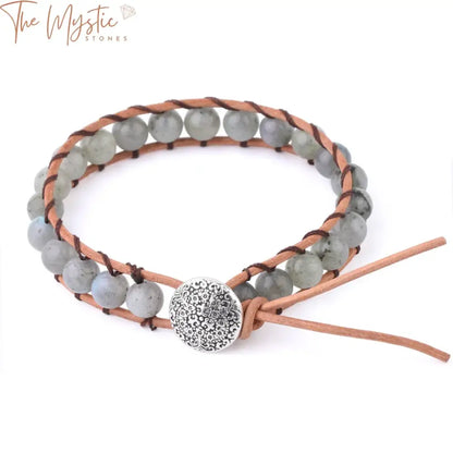 A bohemian-style handmade bracelet featuring natural stone spectrolite and gray labradorite beads.