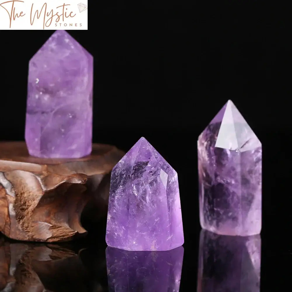 A close-up image of a natural Brazilian amethyst quartz crystal point.