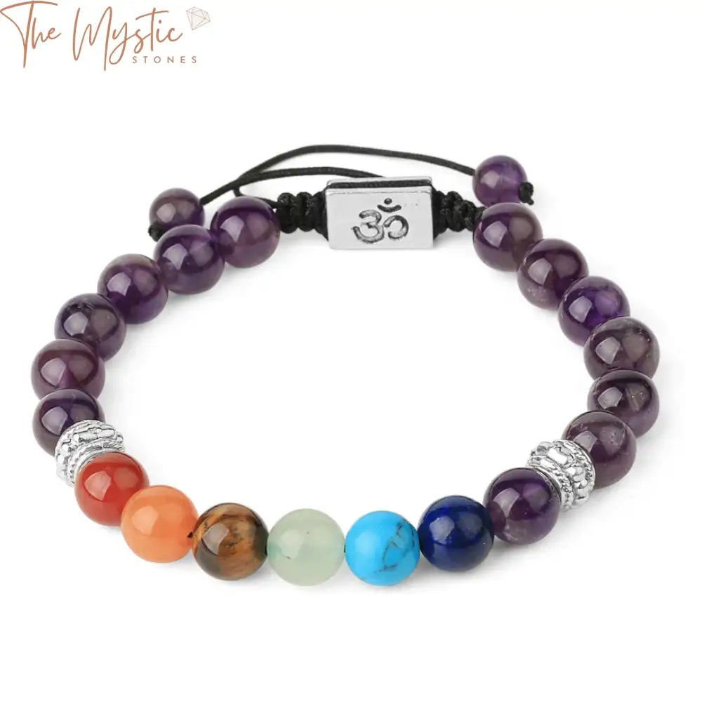 A braided bracelet featuring natural stones representing the seven chakras, each with vibrant colors.