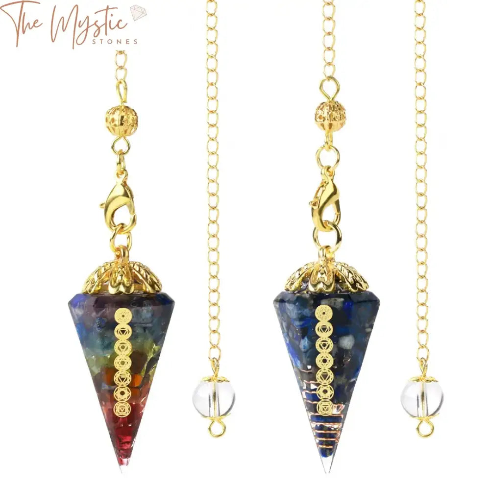 A colorful assortment of seven crystal pendulums aligned in a row, each representing a chakra.