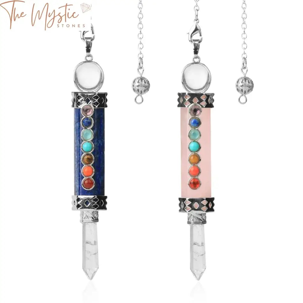 A crystal pendulum featuring a pointed wand made from clear quartz, adorned with a chain of seven chakra stones.