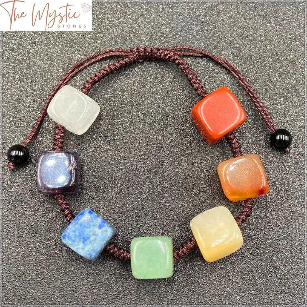 A bracelet comprised of colorful natural crystal cubes, each representing the 7 chakras.