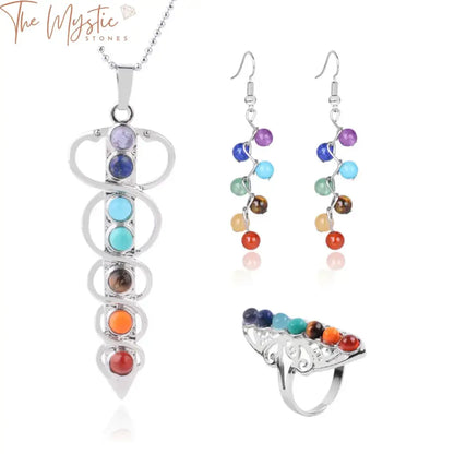 A 7 Chakra jewelry set featuring natural round stone beads, including a necklace, ring, and earrings.