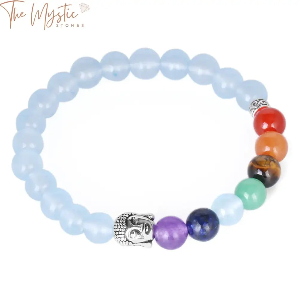 A collection of vibrant, multicolored beads forms a bracelet centered around a serene blue Buddha charm.