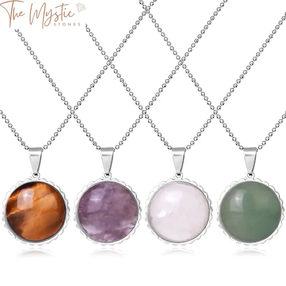 A collection of five round gemstone pendants displayed in a row, each framed by a delicate flower fringe design.