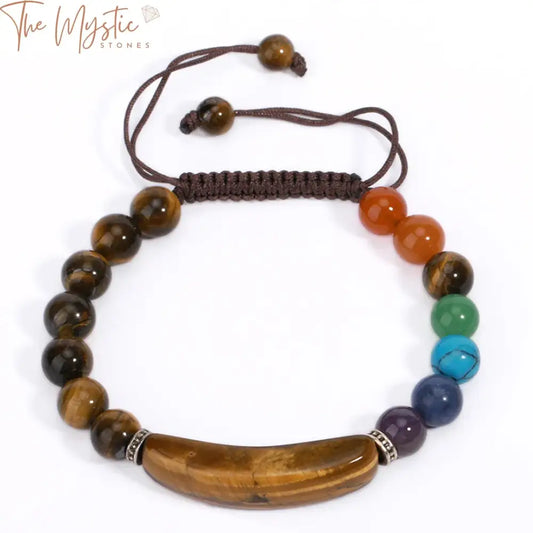 A handmade adjustable bracelet featuring a mix of colorful natural stones, each representing the 7 chakras.