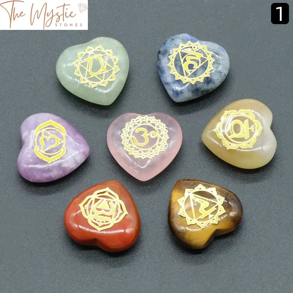 A set of seven heart-shaped stones, each in a different color, representing the seven chakras.