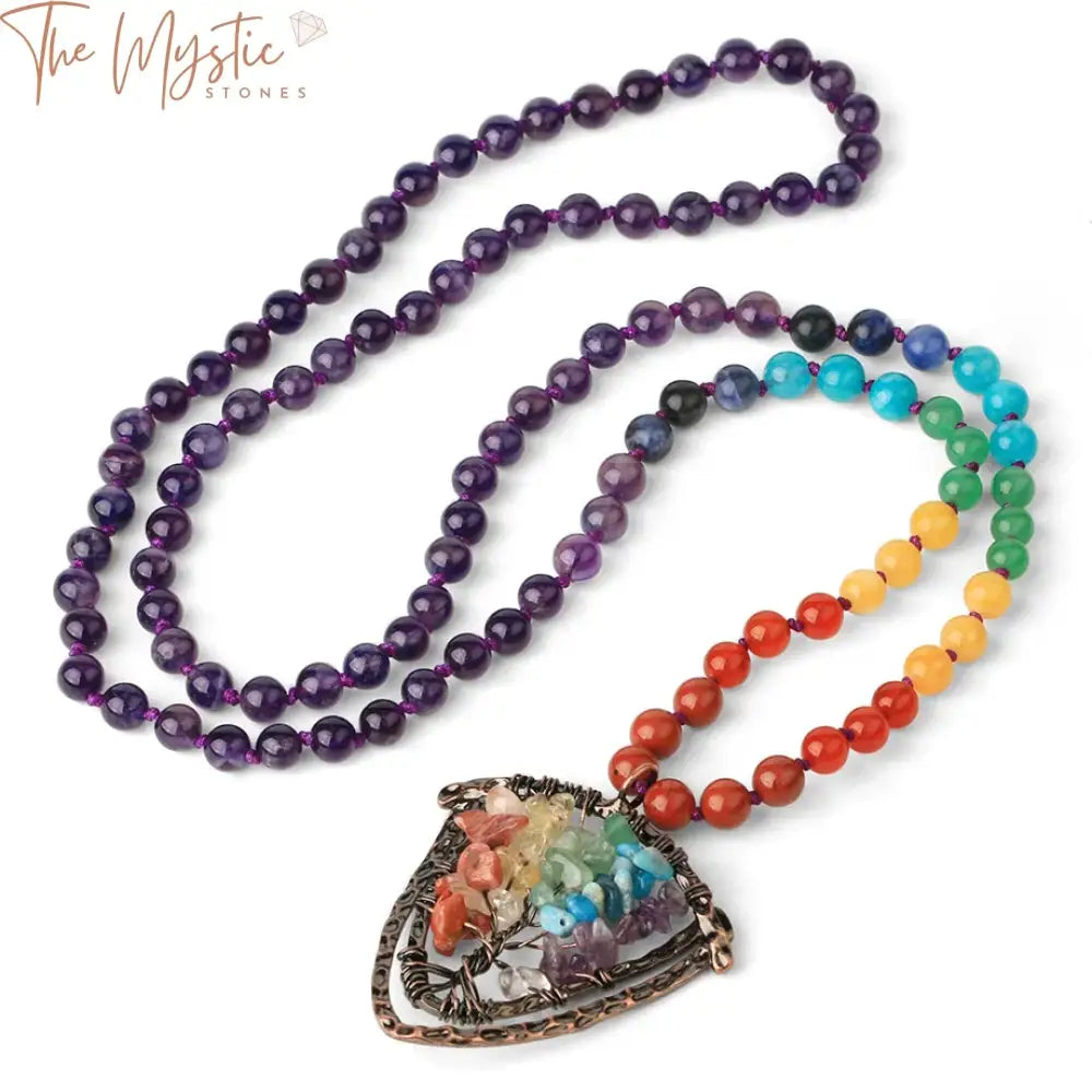 A collection of 108 mala bead long necklaces with a variety of vibrant, natural stones representing the seven chakras.