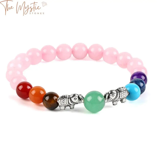 A variety of women's bracelets and bangles featuring the 7 chakra colors, crafted with natural rose crystal mala beads.