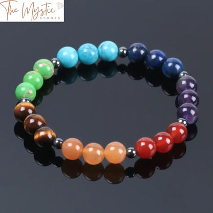 A colorful bracelet featuring 8mm beads representing the seven chakras, each bead a different vibrant color.