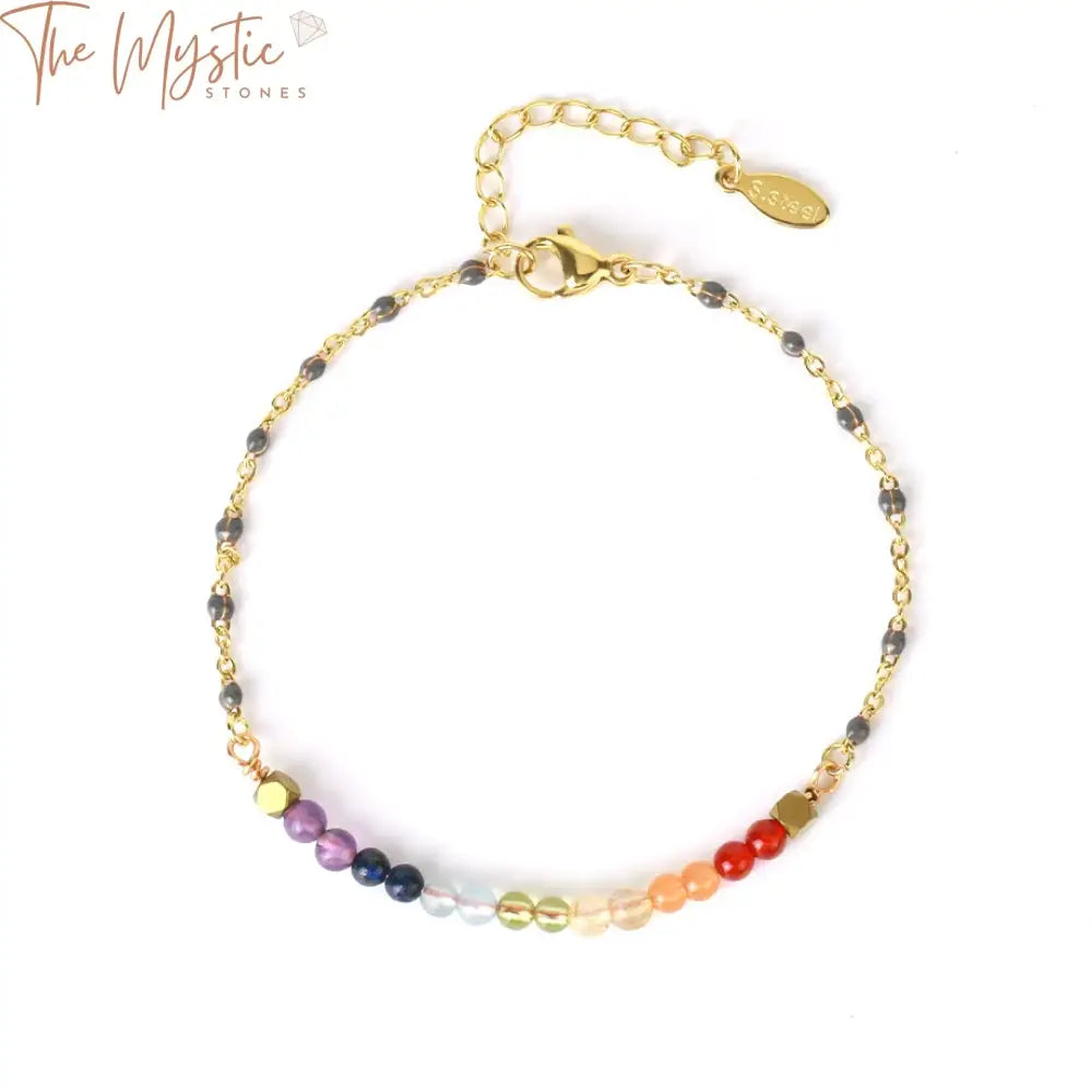 A stainless steel adjustable bracelet featuring a series of vibrant natural stones, each representing the 7 chakras.