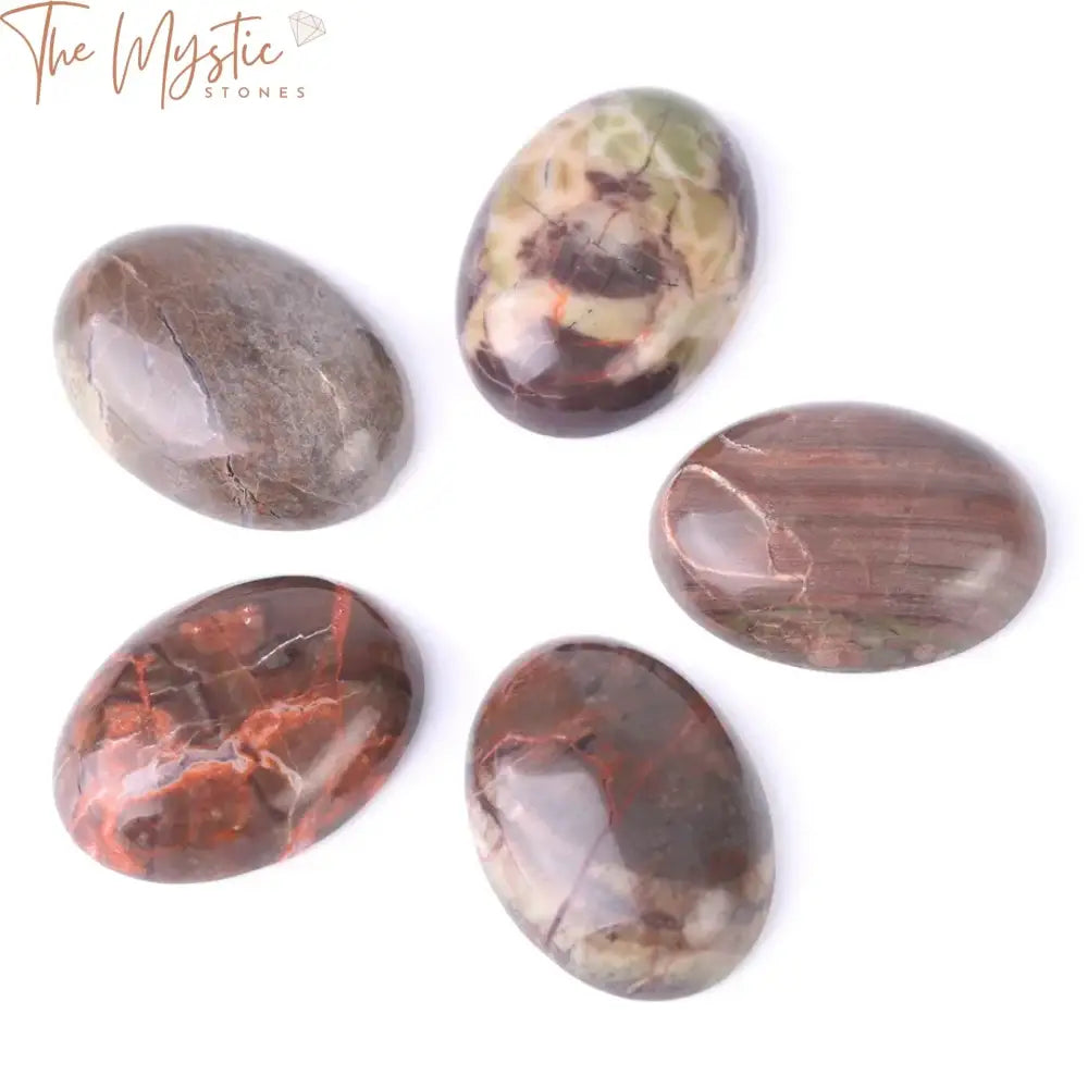 A collection of vibrant, oval-shaped agate cabochons in various natural colors, featuring smooth, polished surfaces.