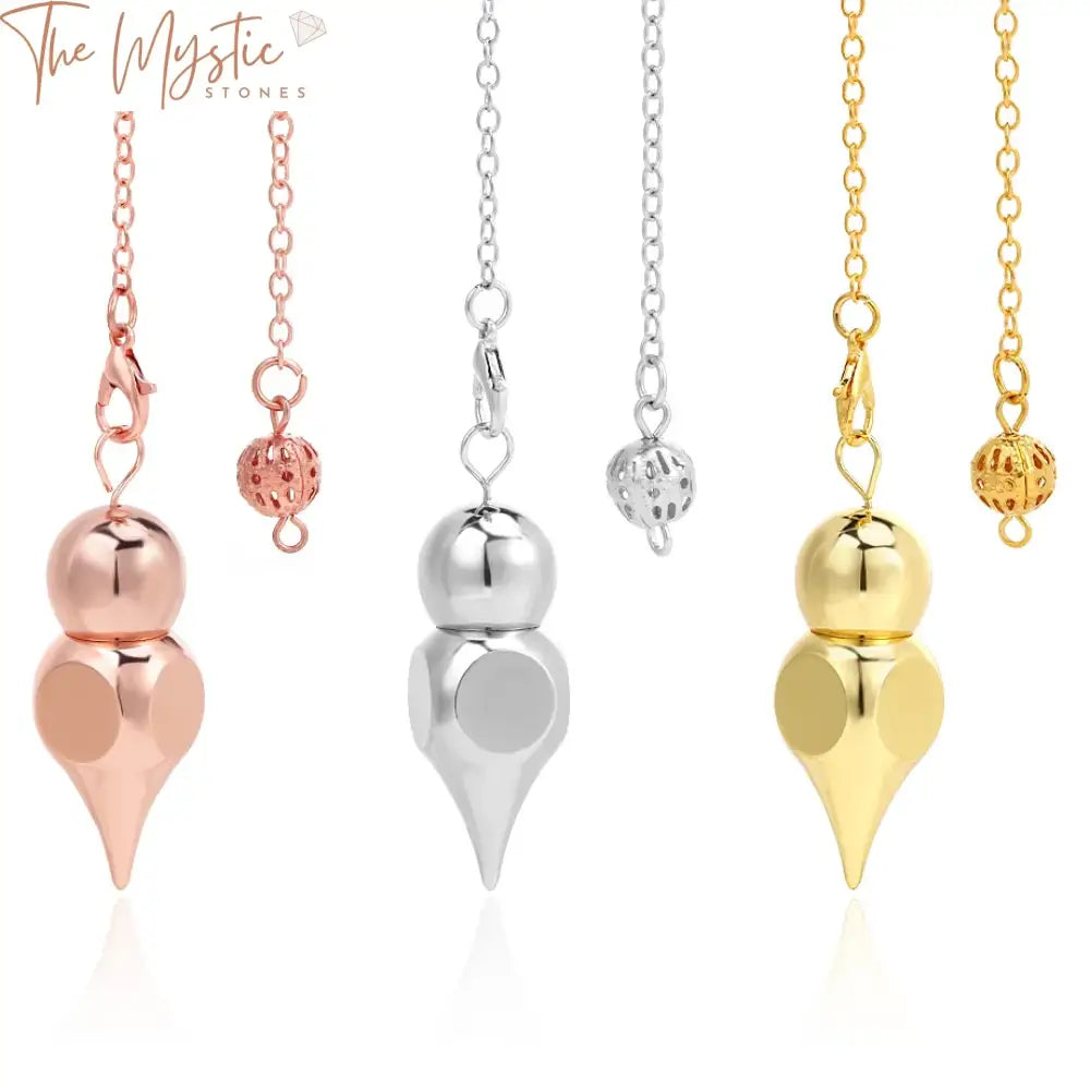 A collection of sleek, metallic pendulums in various shapes, primarily made of copper with a shiny finish.