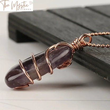 Copper-Wired Rose Quartz Crystal Pendant