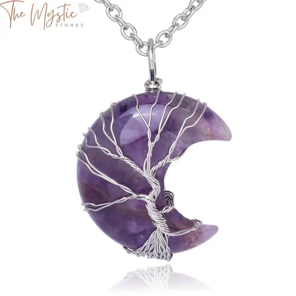 Natural Crystal Pendant Necklace featuring a crescent moon design intertwined with a tree of life motif.