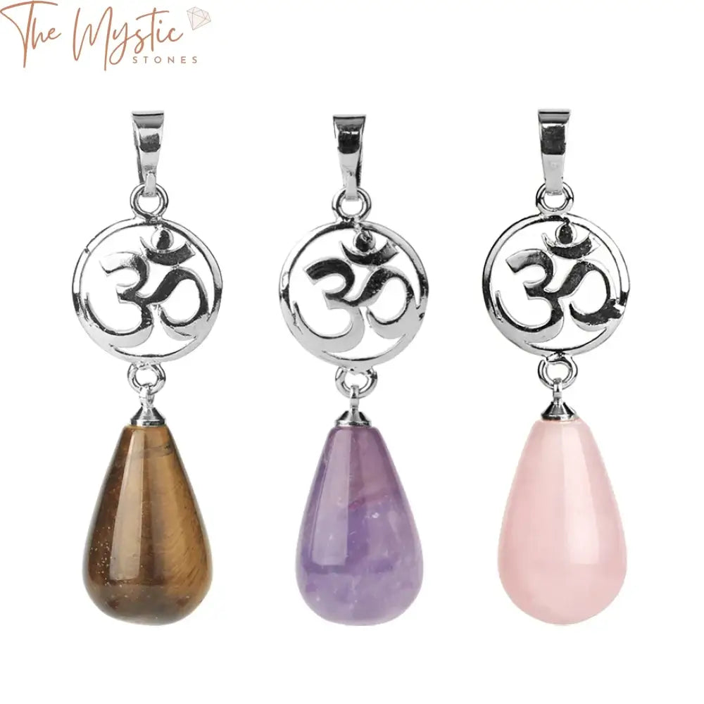 A collection of natural stone crystal pendants is displayed, featuring various shapes and sizes.