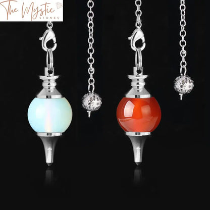 A collection of pendulum pendants made from natural gemstone crystal quartz, featuring a teardrop shape.