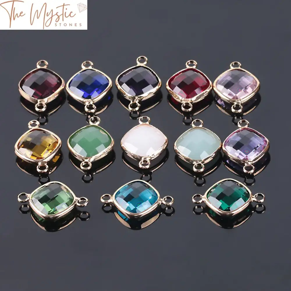 A set of ten 14mm rhombus-shaped crystal glass beads with multiple facets, each featuring two 2.5mm holes for threading.