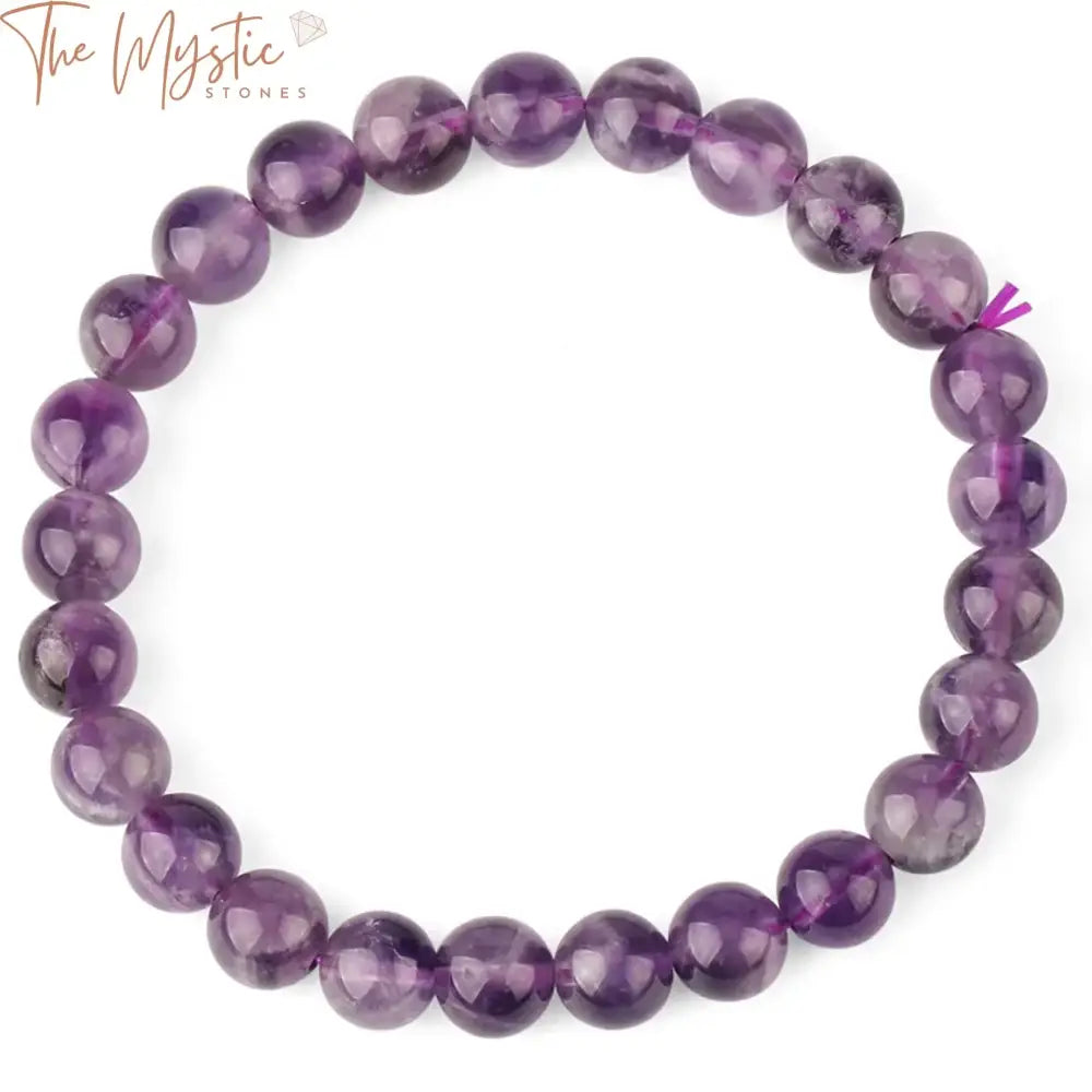 A natural stone elastic bracelet featuring pink quartz, white and purple crystals, and green aventurine beads.