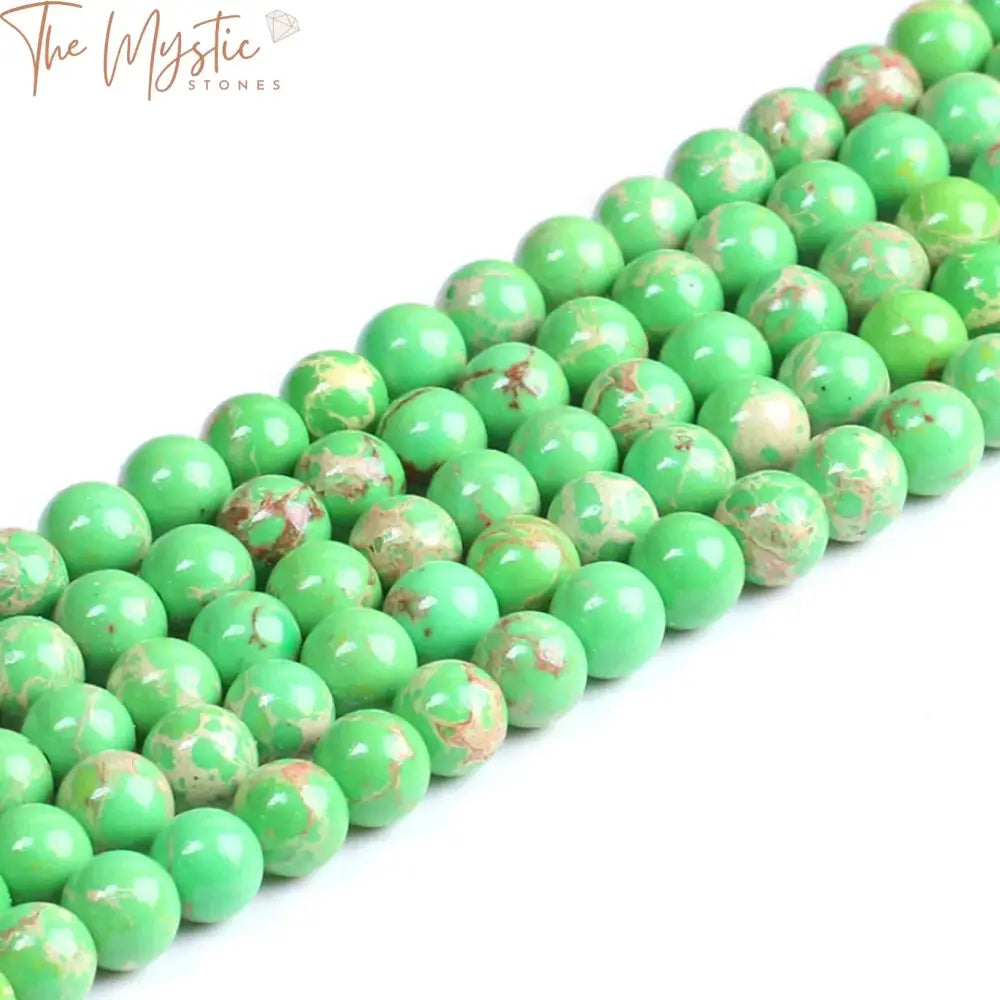 A collection of high-quality Emperor Turquoise Howlite stone beads, each measuring 8mm in diameter.