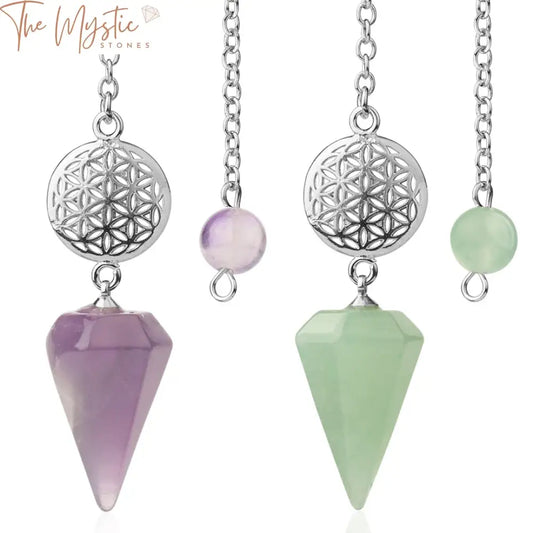 A Flower of Life dowsing pendulum featuring a polished, cone-shaped natural stone crystal.