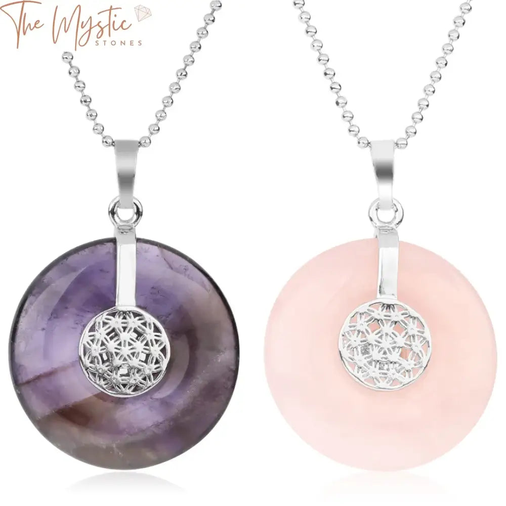 A collection of natural stone necklaces featuring the Flower of Life geometric symbol.