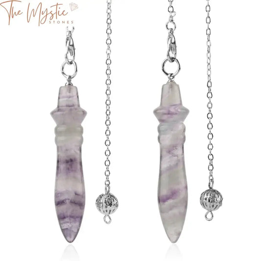 A pendant featuring a natural stone fluorite pendulum in a cone shape, designed as an Indian dowsing or hypnosis amulet.