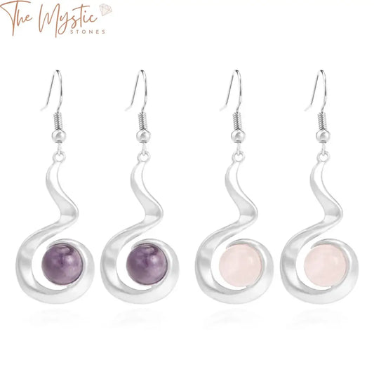 A pair of elegant earrings featuring natural stone drop pendants.